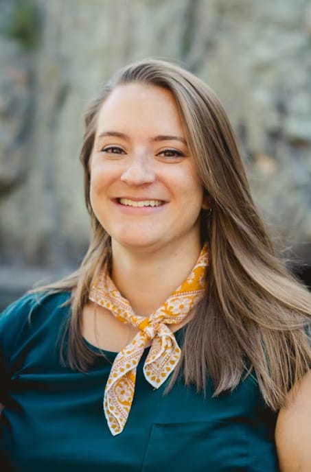 Smiling young woman with long hair