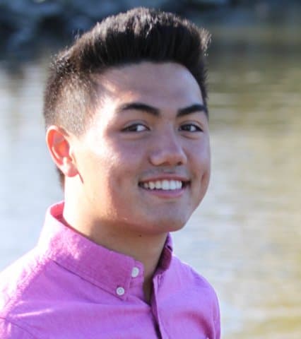 Longmont High Grad in a pink shirt