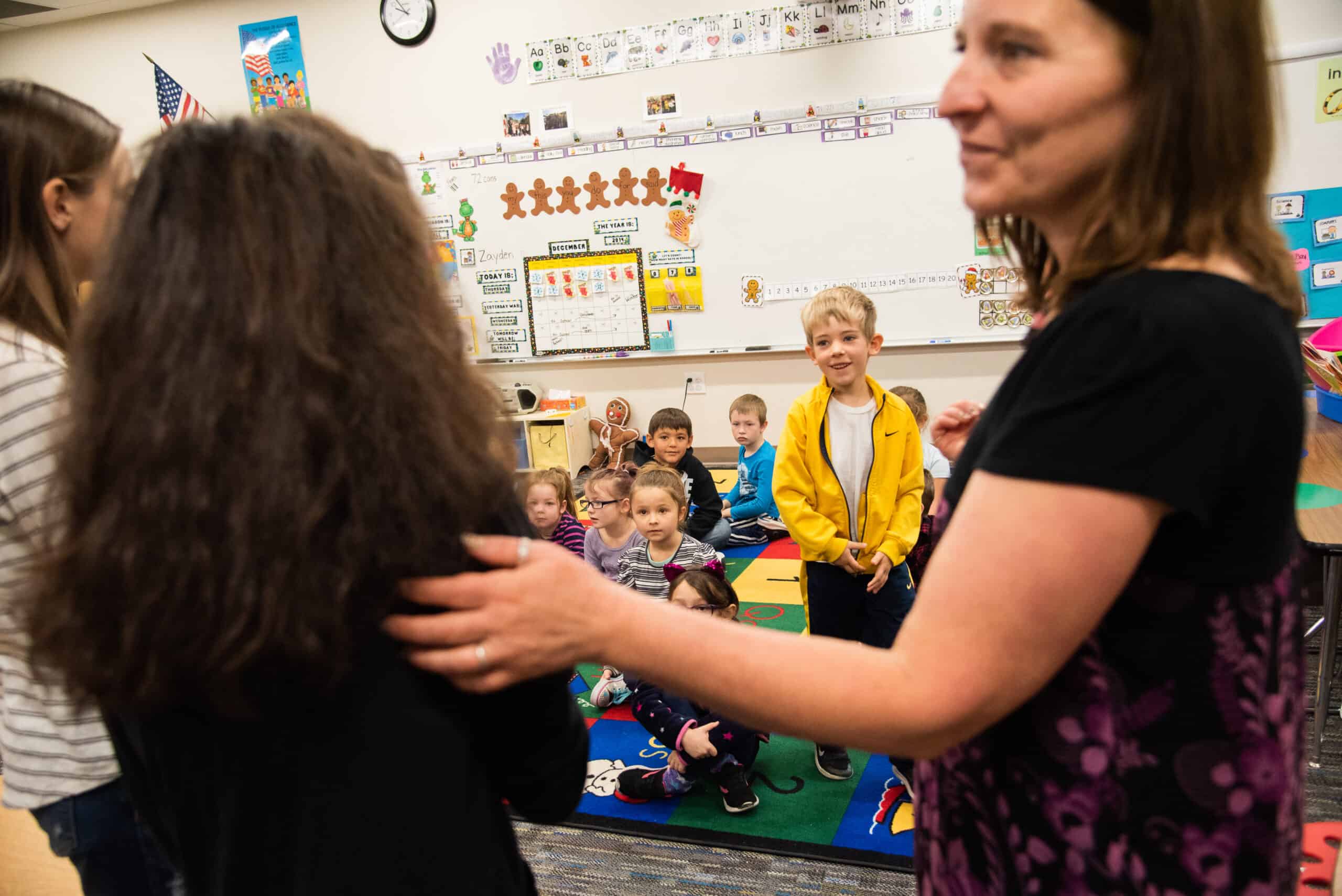 Middle School students meeting elemenetary students