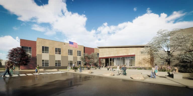 Building rendering of Elementary 28 with students outside gathering and blue sky overhead