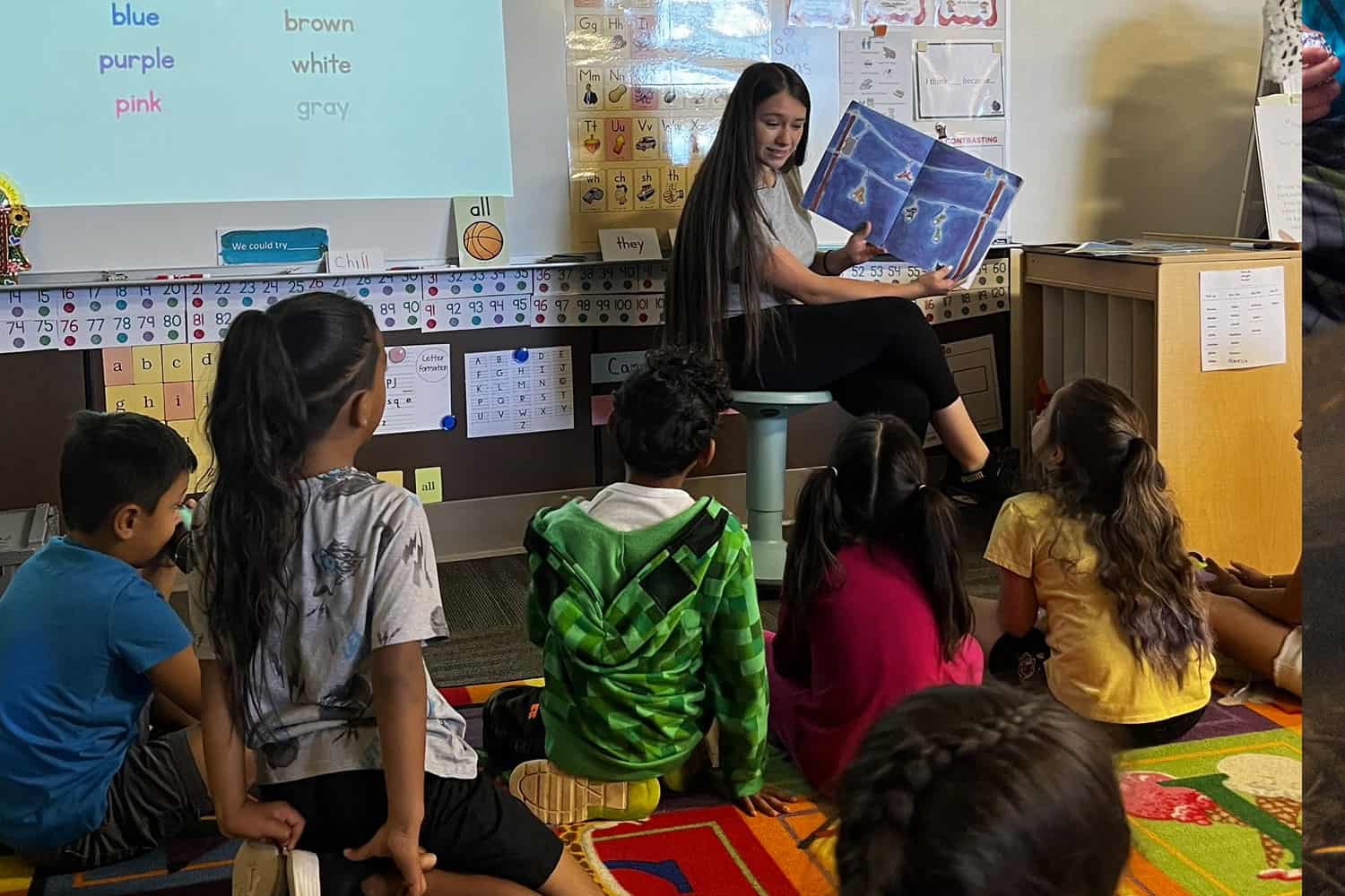 P-TEACH student reading to a class
