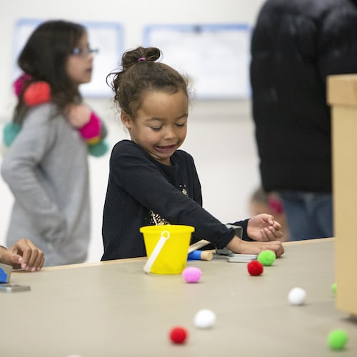 First grade aged female student at STEM night.