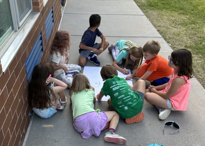 Longmont Estates elementary students working during service project club