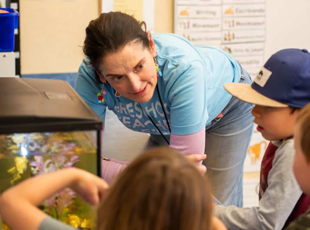 Noreen Reeder with students at Spark! Discovery Preschool 