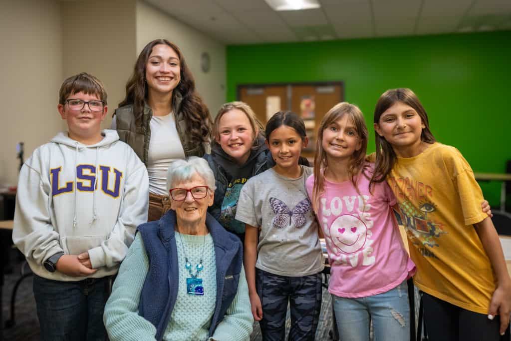 Betty Heath, Angie Bustillos and a group of fourth-grade Legacy Elementary students 