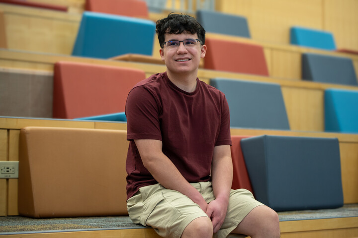 Jacob Trujillo, an Erie High School student, sits in the auditorium at St. Vrain's Innovation Center.