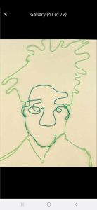 A line drawing of a face created with green wire, featuring abstract hair and facial features on a light background.