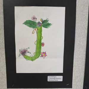 Colorful illustration of the letter "J" adorned with flowers and leaves, displayed on a black background.