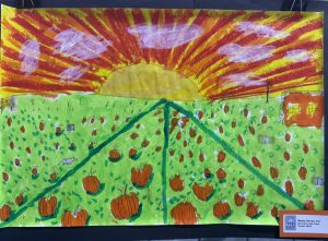 A colorful drawing of a pumpkin patch with a bright sun setting behind a field of pumpkins and green grass.