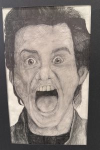 A detailed pencil drawing of a man with wide eyes and an open mouth, expressing a strong emotion.