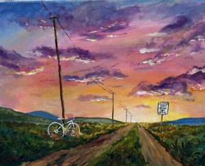 A vibrant sunset over a dirt road, with a white bicycle leaning against a pole and a sign warning against drinking and driving.