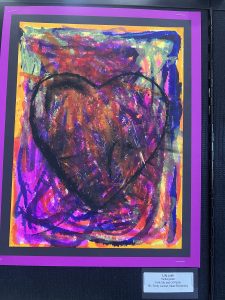 Colorful artwork featuring a large heart surrounded by vibrant swirls and textures, framed in purple and orange.