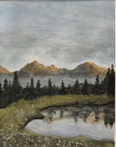 A serene landscape featuring mountains, evergreen trees, and a reflective pond under a cloudy sky.