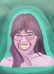 A colorful portrait of a smiling person with glasses, featuring purple tones and a green background.