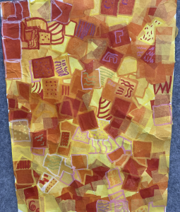 A vibrant collage of orange and yellow squares with various patterns and textures, creating a warm, layered effect.