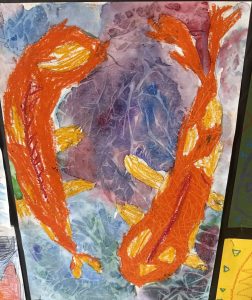 Colorful artwork featuring two koi fish in orange and yellow against a textured purple and blue background.