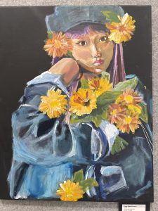 A portrait of a girl with purple hair and a cap, surrounded by vibrant yellow flowers against a dark background.