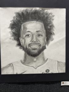 A detailed pencil drawing of a smiling man with curly hair, wearing a sports jersey.