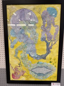 A colorful illustration of jellyfish and bubbles against a bright yellow background, with text at the bottom.