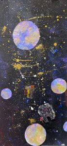 A colorful space scene with various planets in shades of purple, blue, and gold against a black background.